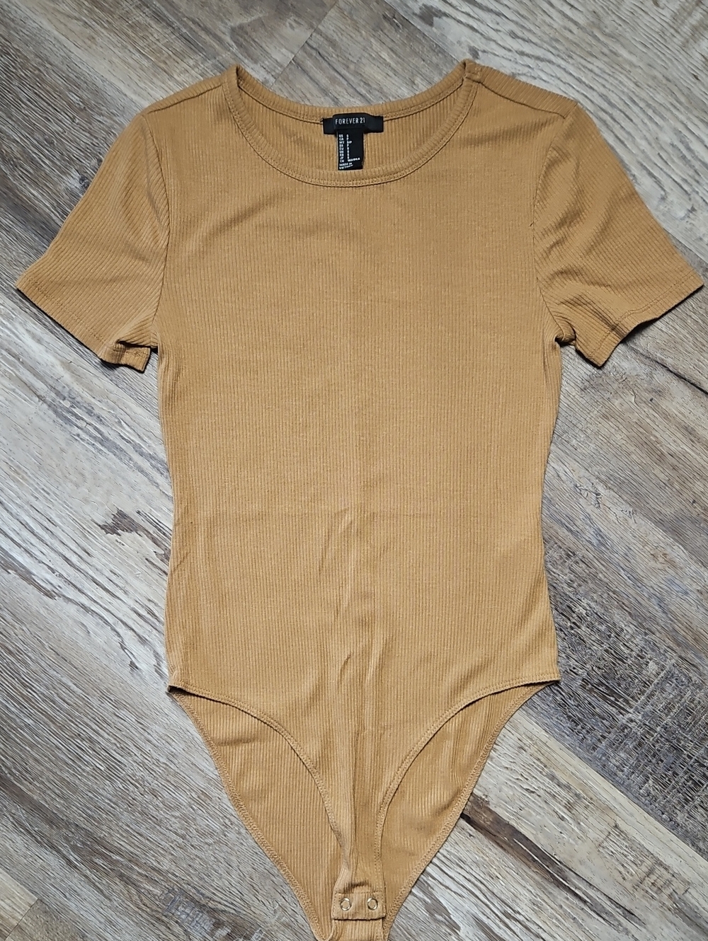 Forever 21 Tan Ribbed Short Sleeve One-Piece Bodysuit